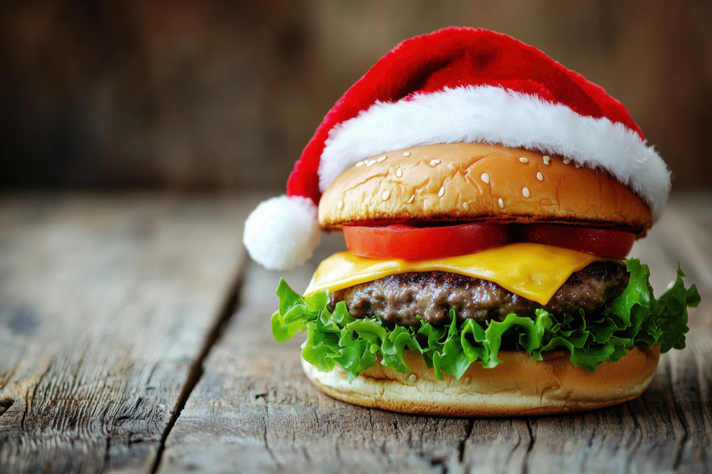 Cheeseburger wearing a Santa hat as a playful Christmas dinner alternative