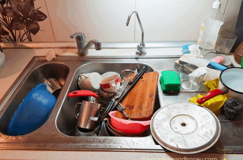 Sink full of dirty dishes