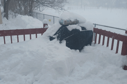 snow covered patio deck