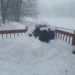 snow covered patio deck