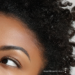 Brow of Black woman with skeptical expression